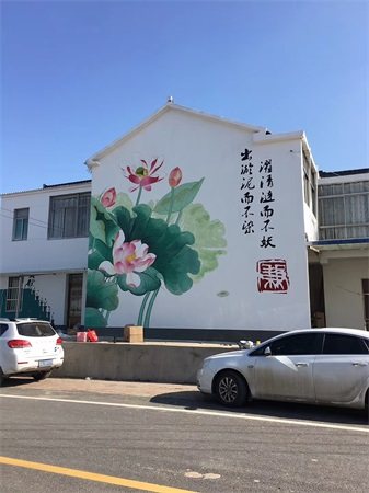 鹤壁思南马路两边都是墙体手绘广告位涂料刷白底写大字.