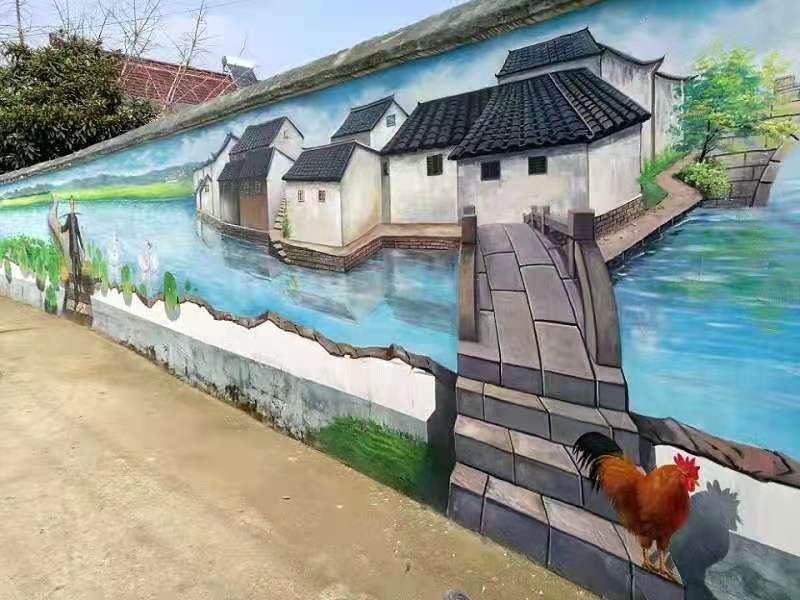 修武县独山乡村振新街道都是民间山水画，做墙体彩绘广告一石二鸟。